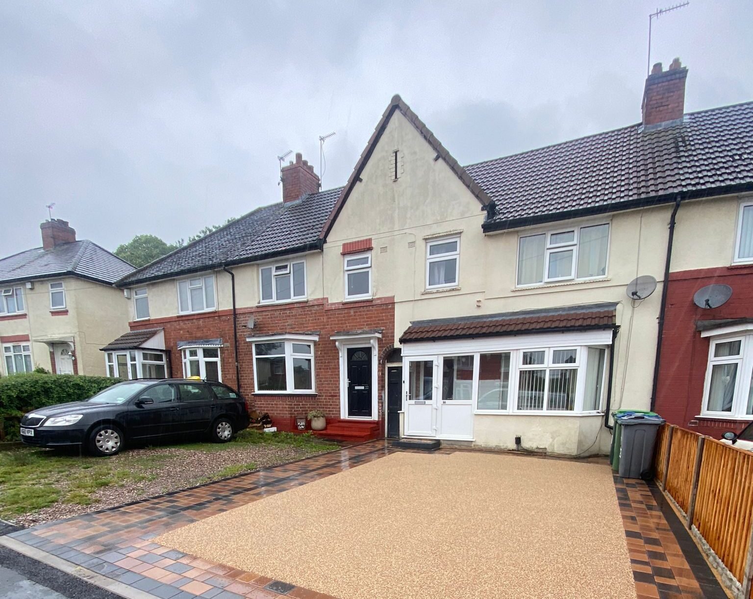 Resin driveway for semi-detached property in Beckenham completed by A1 All Weather Property Solutions.